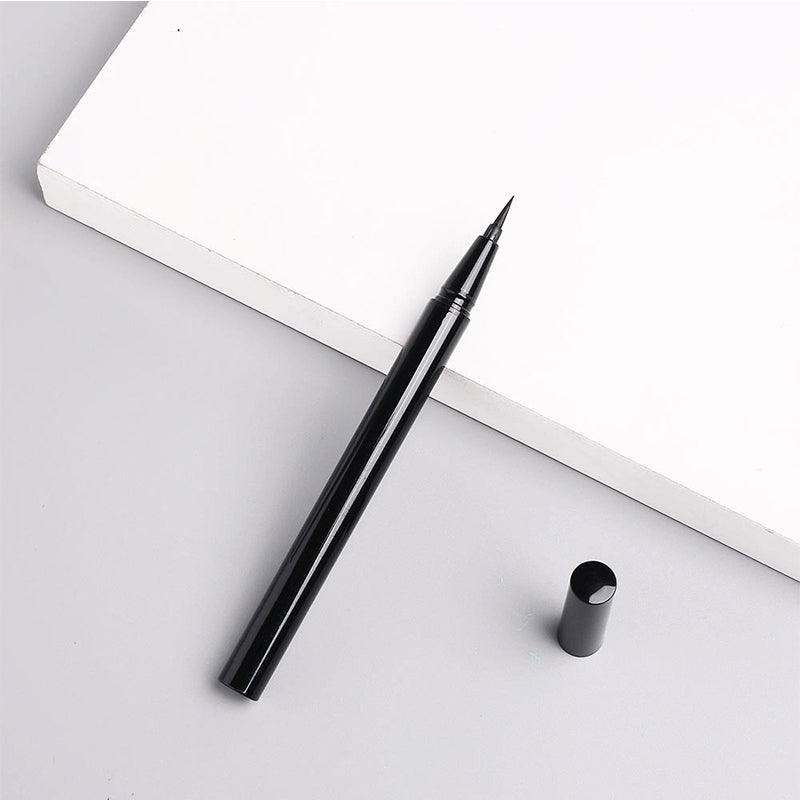 Long-lasting, smudge-resistant eyeliner that stays in place without smudging, providing a thin, dense black line