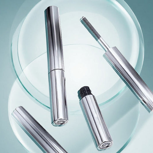 Threaded coil brush head mascara provides distinct, naturally curled lashes