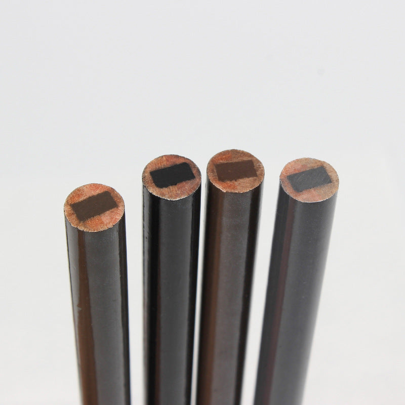 Hard-core scissor-shaped eyebrow pencil, a semi-permanent eyebrow pencil for permanent makeup artists, creating defined individual eyebrow hairs.