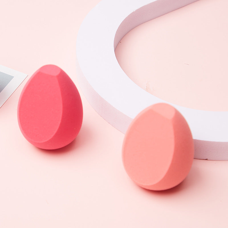 Hydrophilic non-latex rocket-shaped olive-shaped bi-section powder puff, suitable for both dry and wet use.