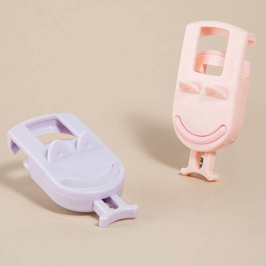 Portable eyelash curler for long-lasting curl and shaping, comes with replacement pads. Ideal for beginners. Mini tweezers.